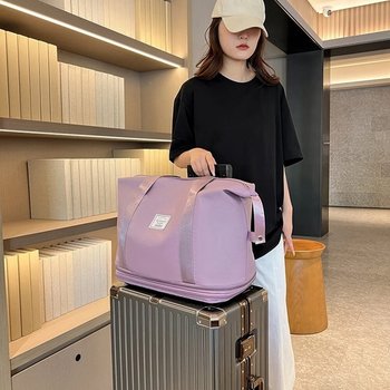 Foldable travel bag for hand luggage on wheels Lilac