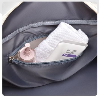 Travel bag with shoe compartment