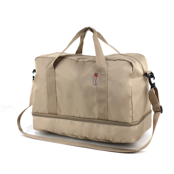 Travel bag with shoe compartment