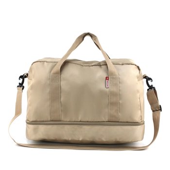 Travel bag with shoe compartment